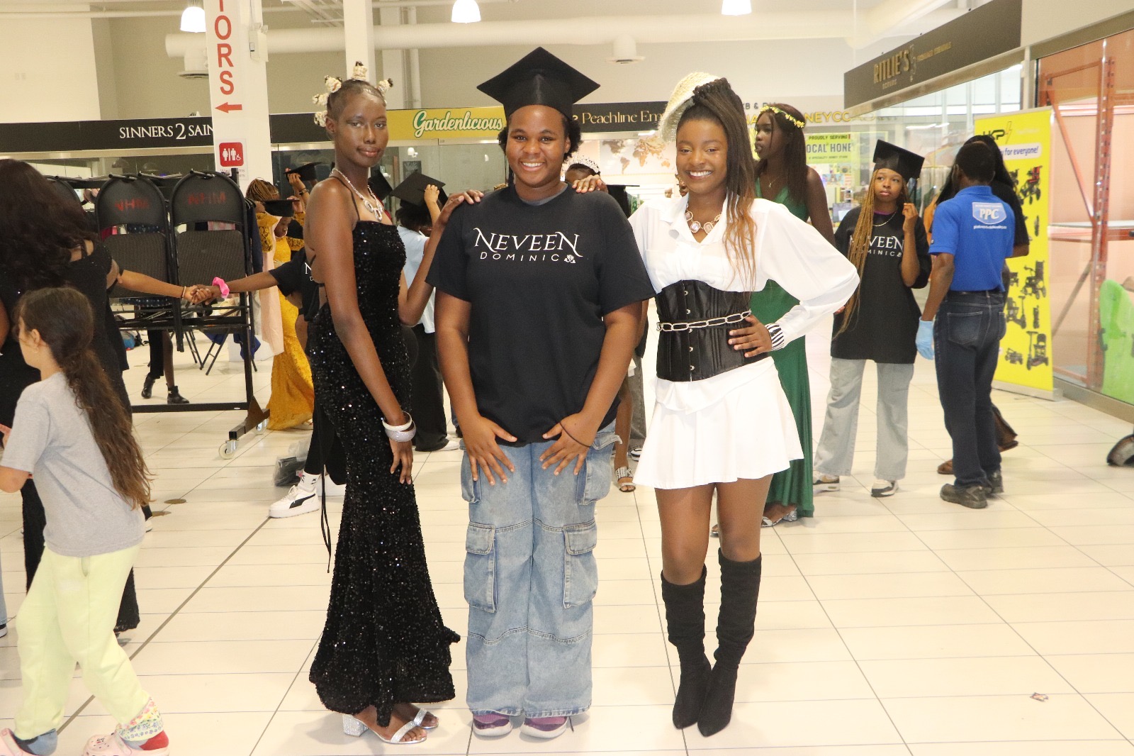 Graduates of the Summer Beauty & Leadership Camp pose together on graduation day